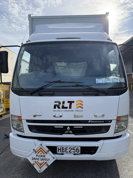 Photograph of an RLT Transport truck ready for same-day or urgent freight